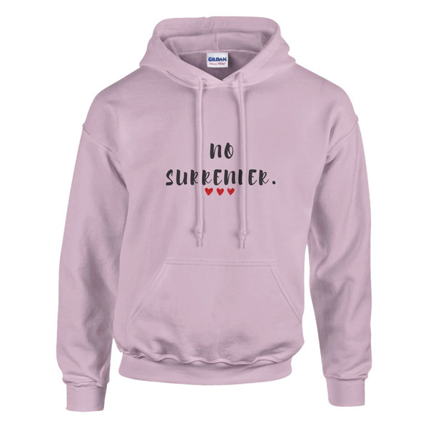 Pink pullover hoodie featuring the inspirational quote “No Surrender” with red heart accents, motivational unisex sweatshirt design promoting resilience, determination, perseverance, strength, and hope.