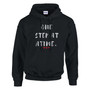 Black pullover hoodie featuring the inspirational phrase “One Step at a Time” in distressed white lettering with three small red hearts beneath. The hoodie includes a drawstring hood, front kangaroo pocket, and classic unisex fit. The encouraging design promotes resilience, hope, and steady progress through life’s challenges.