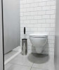 brush next to toilet