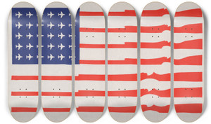 6-deck skateboard installation of the 1970 anonymous poster [U.S. flag: guns for stripes, planes for stars.] featuring warplanes and rifles.
