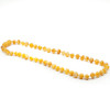 Maximum effort Polished Egg Yolk Amber necklace