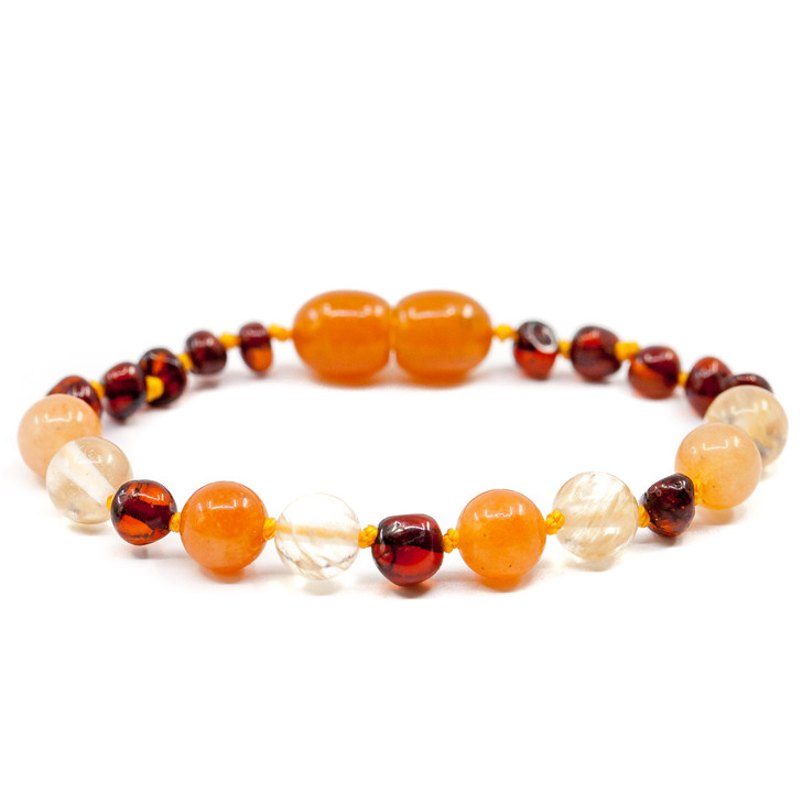 amber teething necklace on ankle
