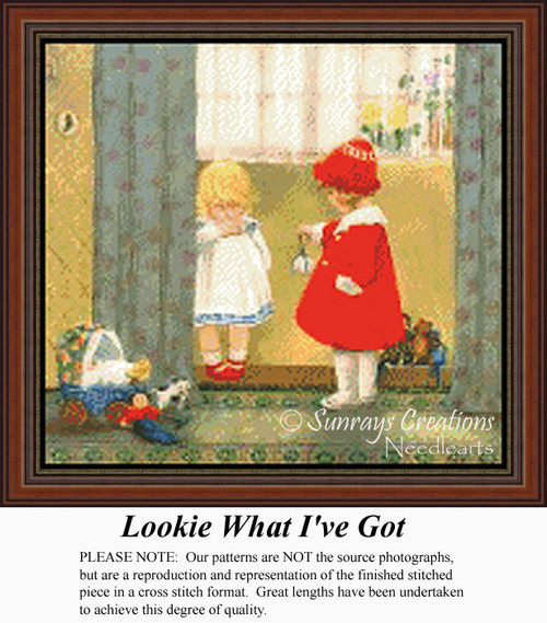 A little girl in a white dress shows her toy to another girl in a red outfit, stitched as a counted cross stitch kit, set in a cozy interior.
