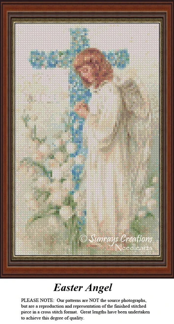An angel stands beside a blue-flower covered cross, with lily of the valley at her feet, offered as a counted cross stitch pattern.