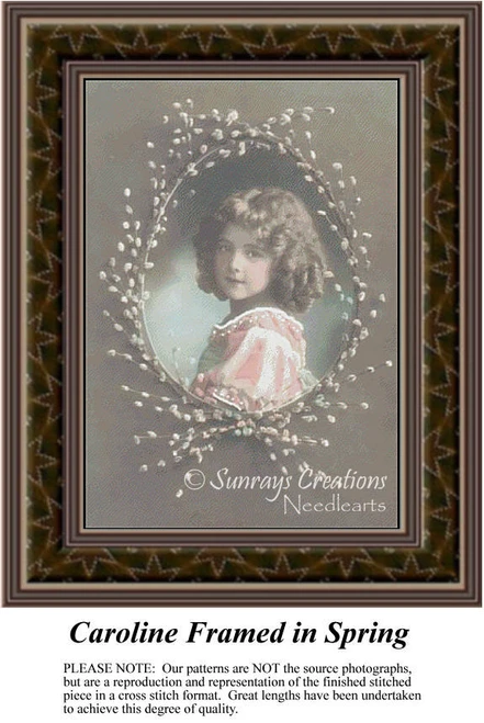 A little girl with brown corkscrew curls is framed in pussy willows, come to life as a counted cross stitch design.