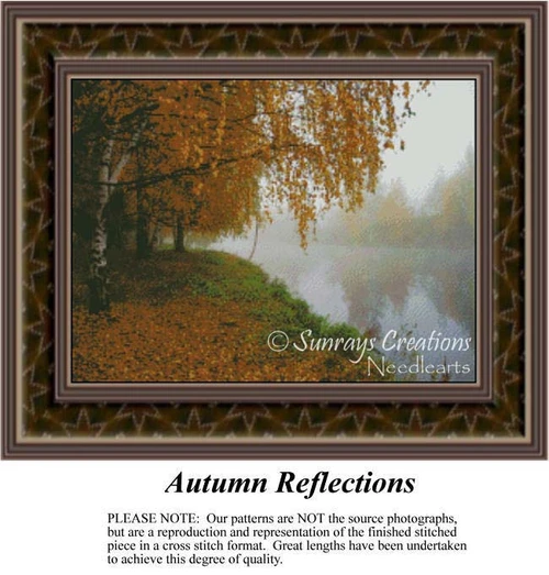 A tranquil riverbank lined with trees adorned in rich autumn foliage, envisioned as a BAP cross stitch pattern titled Autumn Reflections.