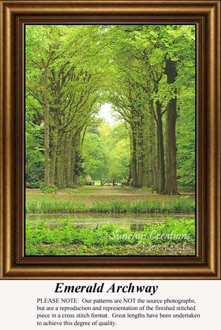 A serene archway of lush green trees frames a park bench at the center, brought to life as a counted cross stitch pattern.