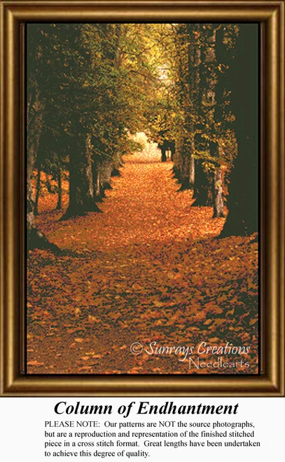 A tree-lined path blanketed with autumn leaves leads to a golden clearing, yours as a counted cross stitch kit.