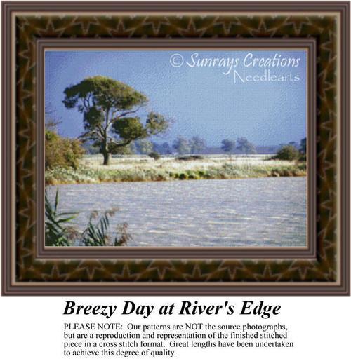 A serene river glimmers under the sun with gentle currents, brought to life as a counted cross stitch pattern.