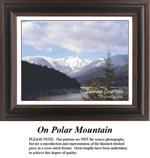 A detailed counted cross-stitch pattern preview of the alpine landscape artwork, "On Polar Mountain." The breathtaking design features a snow-dusted mountain peak rising majestically over a quiet lake and dark evergreen pine forest under a atmospheric, clouded sky.