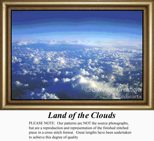 A scenic aerial view of fluffy clouds against a bright blue sky, preserved as a counted cross stitch pattern.