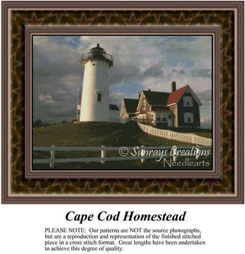 A lighthouse stands on a hill beside a cozy cottage, overlooking the ocean under a gray sky in this cross stitch project titled Cape Cod Homestead.