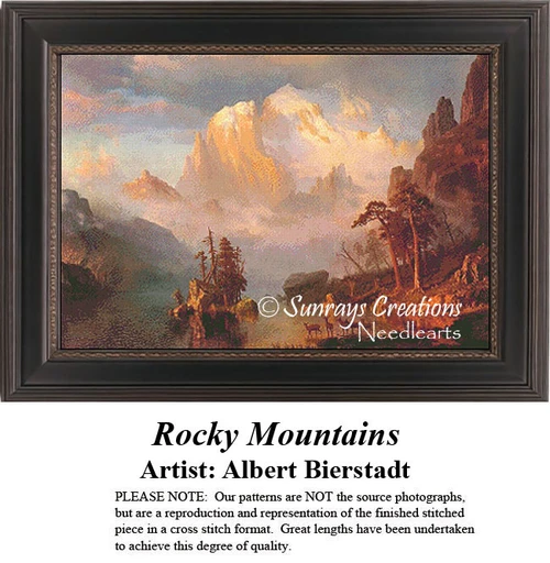 A landscape of majestic mountains bathed in golden light, stitched as a counted cross stitch design from Albert Bierstadt's artwork.