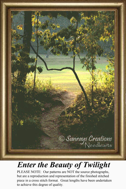 A winding path leads through tall grass to a glowing clearing at dawn, captured as a counted cross stitch pattern.
