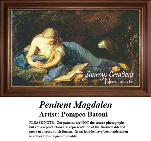 A woman with long hair kneels in prayer, surrounded by dark foliage, brought to life as a counted cross stitch pattern.