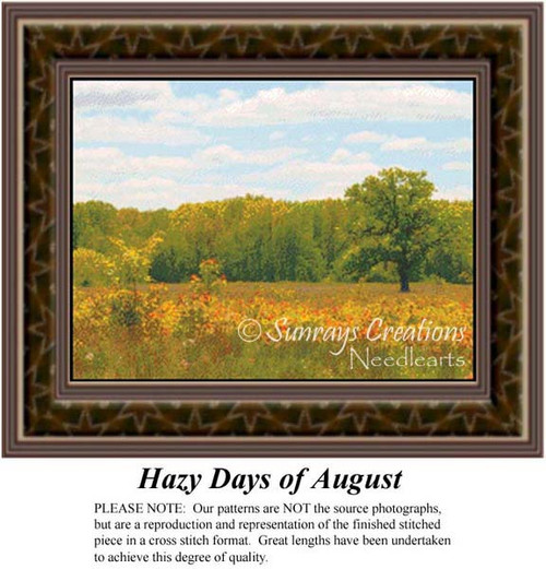 A serene landscape of trees and tall grasses under a blue sky, brought to life as a counted cross stitch pattern.