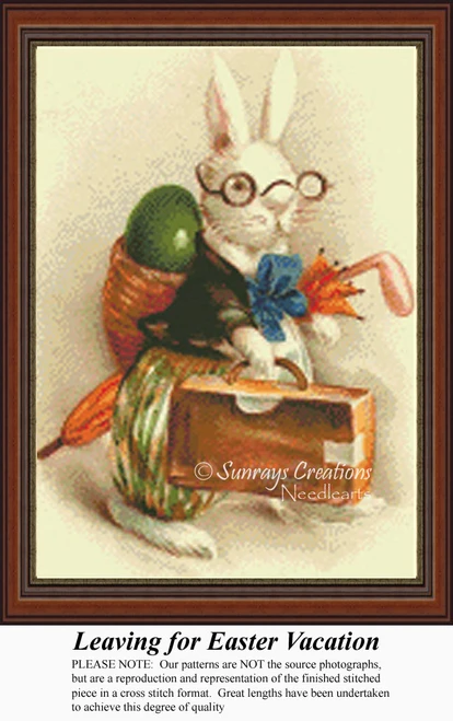 A distinguished bunny wearing glasses holds a suitcase, an umbrella, and a green egg, prepared for a sunny Easter vacation in this BAP cross stitch.