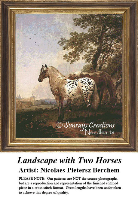 Two horses, one calico and one spotted, stand in the shade under a tree, immortalized as a counted cross stitch pattern.