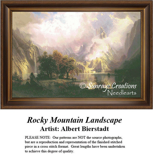 A serene Rocky Mountain landscape at dawn with rising fog and mist enveloping towering peaks, designed as an xstitch kit from Albert Bierstadt's art.