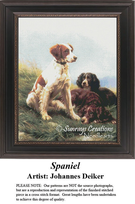 A trio of dogs rests on a grassy hill, with one sitting alertly and two lying down, in this xstitch design by Johannes Deiker.