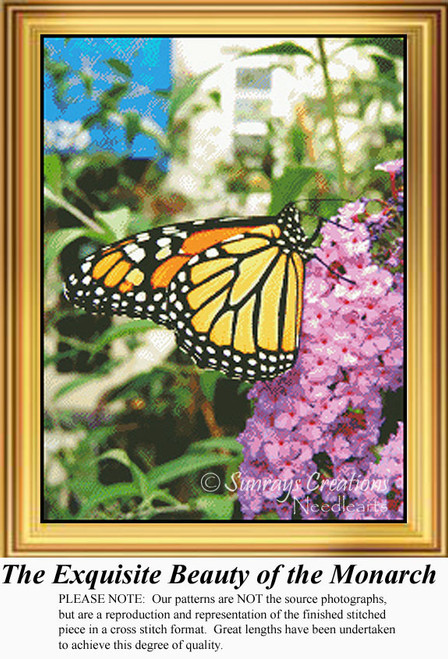 A Monarch butterfly rests on a cluster of pink phlox flowers in this vibrant cross stitch project, showcasing the beauty of nature in needlework.
