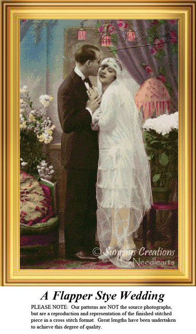 A newly married couple dressed in flapper style stands among flowers and lanterns. This large counted cross stitch piece reflects the Roaring 20s.