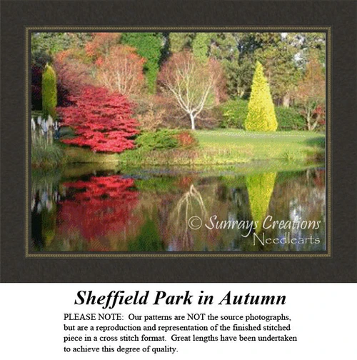 A tranquil pond reflects vibrant fall colors, including red euonymus and a chartreuse tree, brought to life as a counted cross stitch pattern.