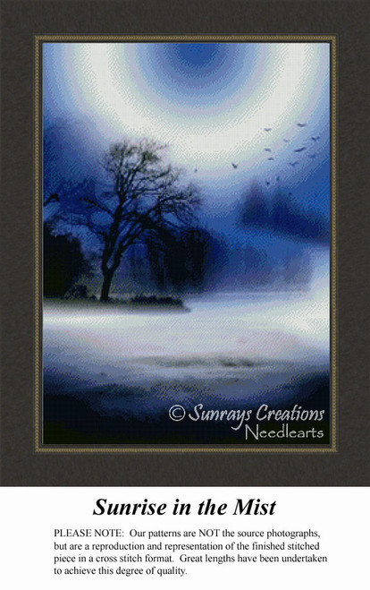 A misty landscape at dawn with a dark tree silhouette beneath a blue sky and birds flying, designed as a counted cross stitch design.
