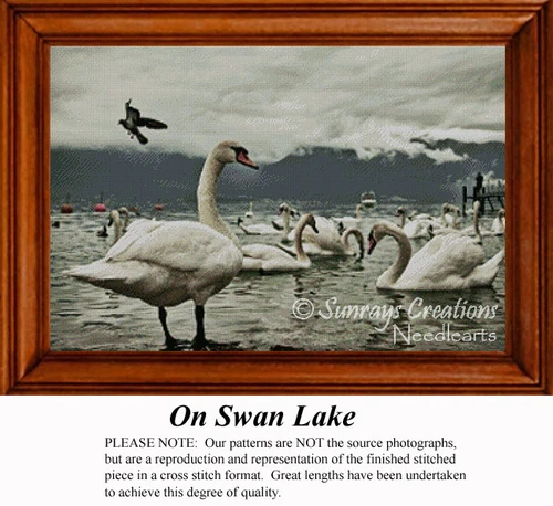 A serene scene of swans and other birds gathered on a lake under a cloudy sky, designed as a cross stitch pattern for your stitching enjoyment.