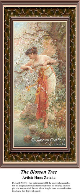 A woman leans gracefully on a blossoming tree branch, draped in flowing fabric, in this cross stitch pattern by Hans Zatzka.