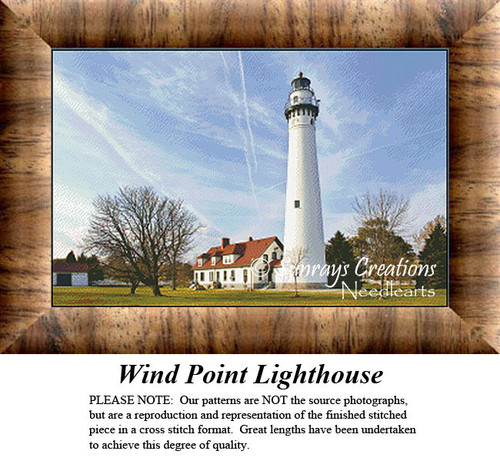 A tall white lighthouse stands against a clear blue sky, come to life as a counted cross stitch design.