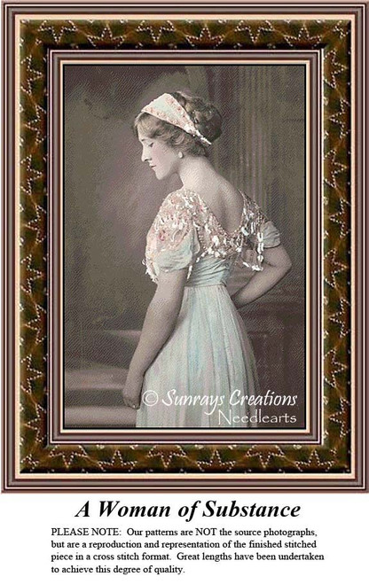 A young woman with a decorative headband and a lacy bodice dress in mint green stands gracefully, presented as a PDF chart for cross stitch projects.
