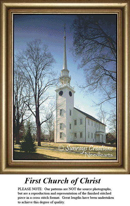 A white church with a tall steeple stands among bare trees against a blue sky, available as a digital file for cross stitch.