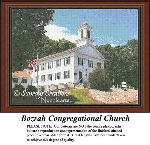 A white church building with a steeple sits surrounded by trees and an American flag, represented in a counted cross stitch kit format.