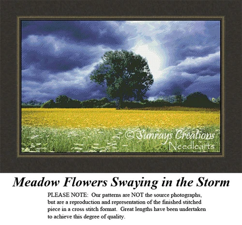 A large tree stands in a field of golden flowers under a stormy blue sky, shown as a landscape xstitch pattern with vivid colors.