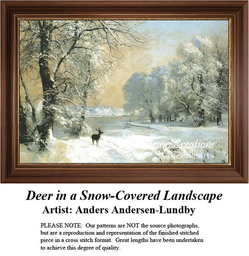 A deer walks through fresh-fallen snow under a clear blue sky, surrounded by snow-covered trees in this xstitch kit by Anders Andersen-Lundby.