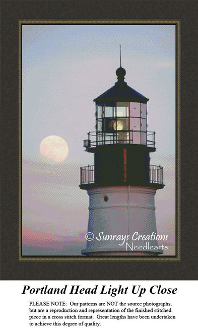 A lighthouse stands against a pastel sky with a rising moon, created as a counted cross stitch pattern.