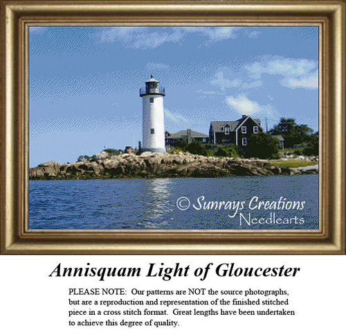 A lighthouse at Annisquam Harbor on rocky shores, shown in a downloadable pattern that uses DMC floss to create a nautical scene.