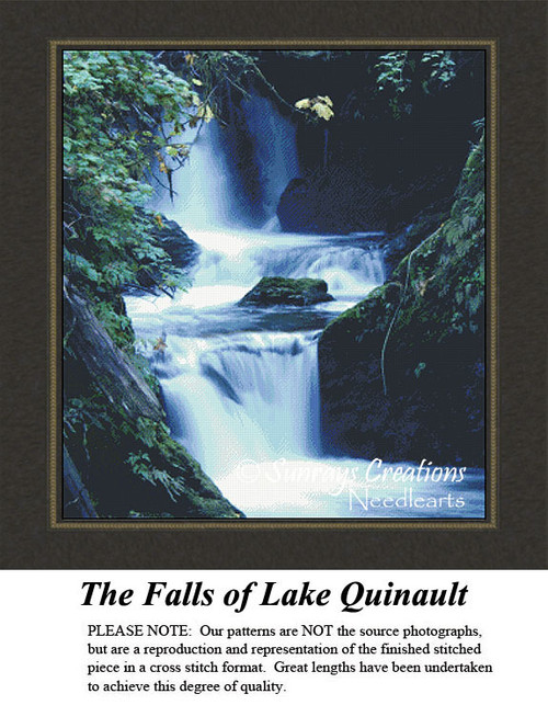 A waterfall surrounded by lush dark green and emerald leaves, depicted in a counted cross stitch kit titled The Falls of Lake Quinault.