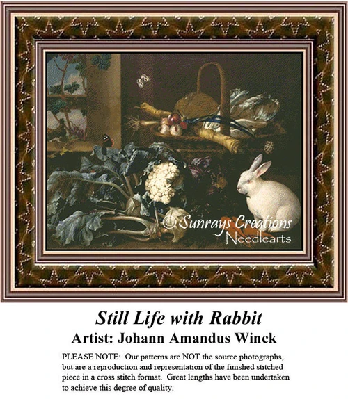 A rabbit sits beside vegetables and a woven basket, in a counted cross stitch design based on Johann Amandus Winck's still life painting.