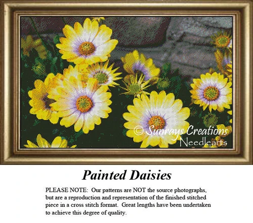 A vibrant display of yellow daisies set against a rocky wall, presented as a PDF pattern for cross stitch enthusiasts.