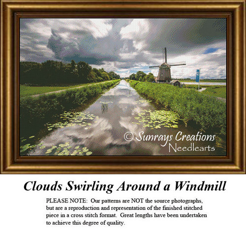 A distant windmill sits near a canal, under swirling clouds signaling an impending storm, perfect for a cross stitch project.