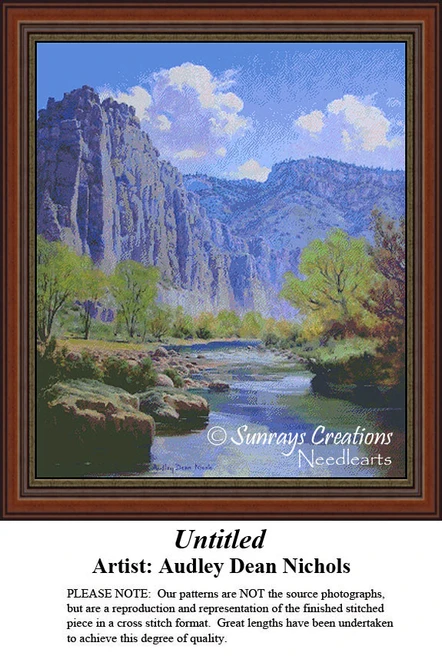 A serene landscape with tall blue mountains and a stream surrounded by boulders and greenery, designed as a printable pattern by Audley Dean Nichols.