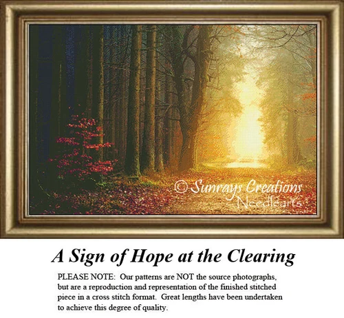 A forest scene with a path of autumn leaves leading to a bright clearing, featuring a small tree with vibrant leaves, available as a PDF chart.
