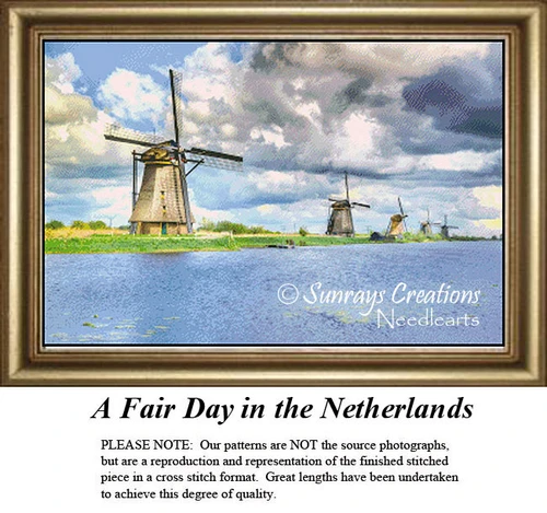 A serene lake scene with traditional windmills along the shore under a cloudy sky, offered as a PDF chart by Sunrays Creations.