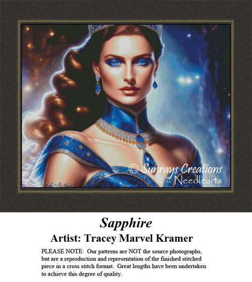A woman with long, dark hair and blue eyes wears a striking blue dress adorned with sapphires, illustrated as a counted cross stitch design.
