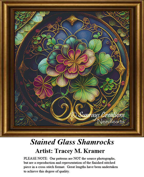A circular shamrock design in shades of teal, green, bronze, and mauve, accented with gold tendrils, is shown as an xstitch kit.
