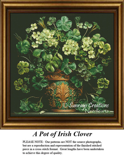 A vibrant flower pot filled with lush green clovers in various shades, designed as a cross stitch chart ideal for any Irish-themed project.