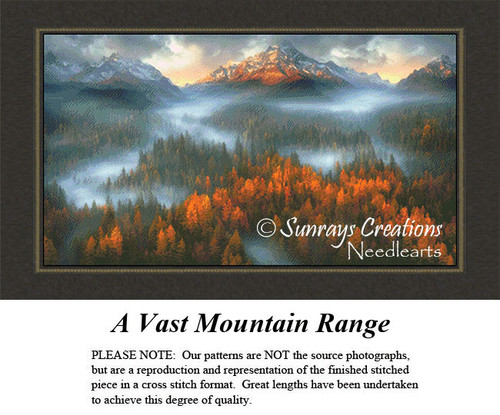 A landscape xstitch chart of a vast mountain range with autumn trees in shades of orange, bronze, and green, surrounded by misty valleys.