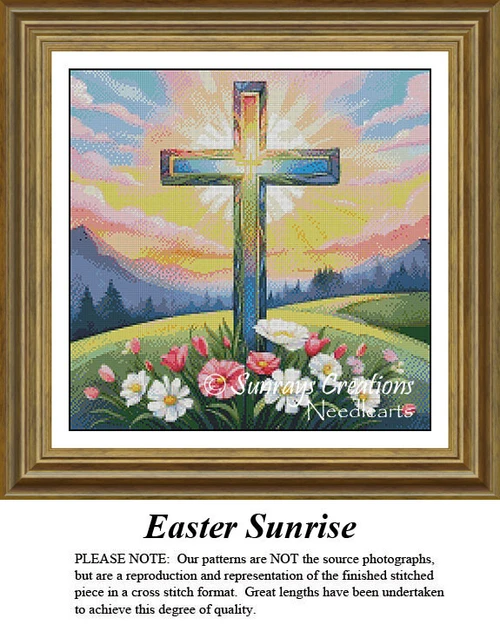 A stained glass cross stands on a hill adorned with flowers, illuminated by sunlight in the background, presented as a cross stitch chart.